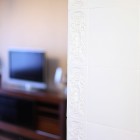Biały piec kaflowy w klasycznym klimacie Dom Mikołów