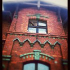 Śmietankowe wnętrze z cegłą w tle Dom Tychy